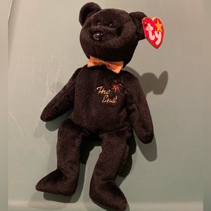 NWT BEANIE BABY - “The End” bear. Kept in collectible case.